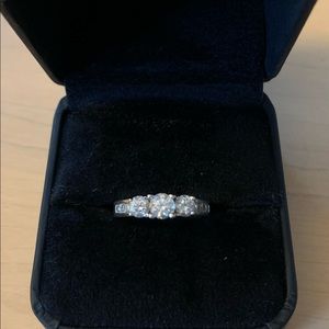 Diamond Ring. 3-Stone. 1 carat total weight 14K white gold band w inset diamonds